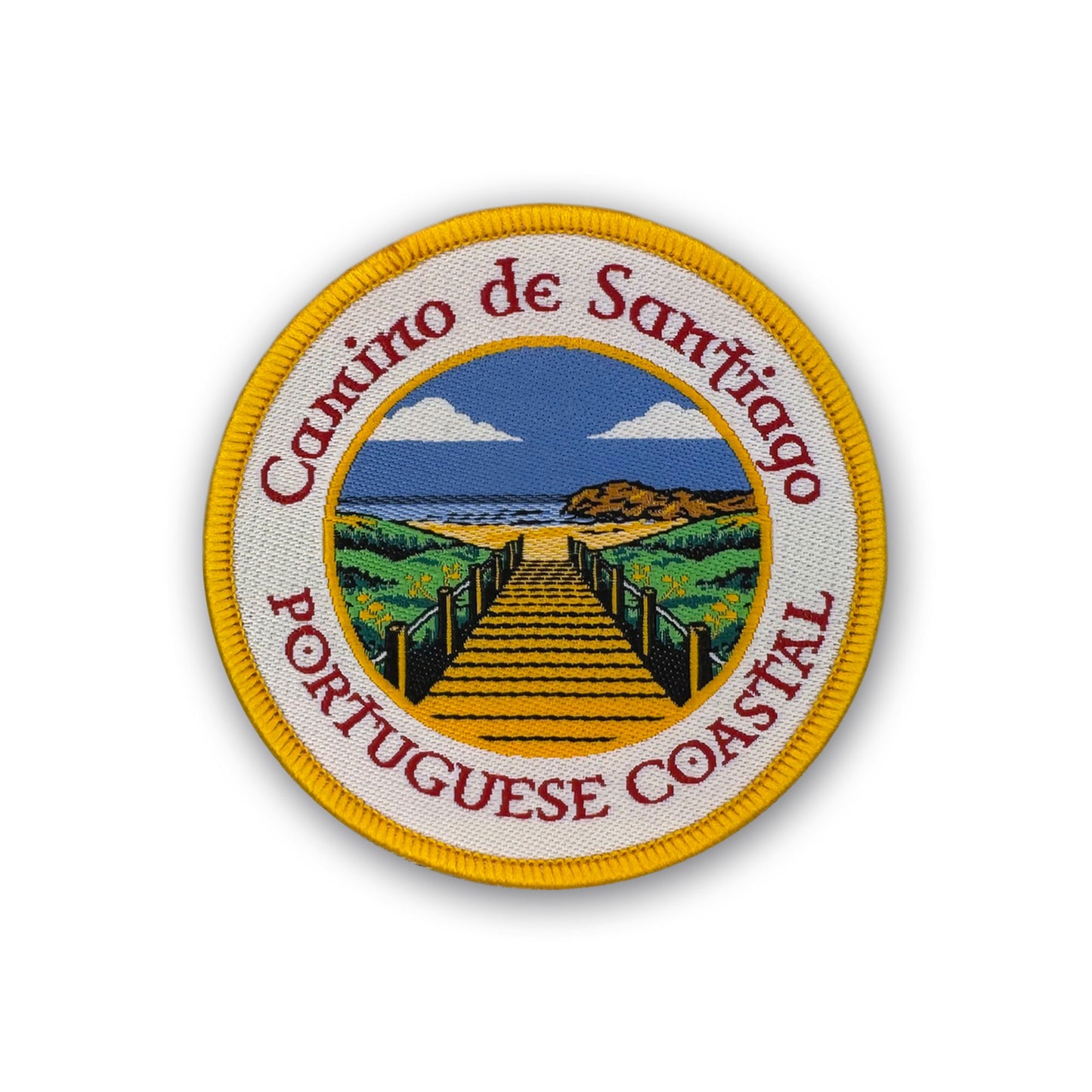 Portugués Coastal patch showing wooden boardwalk leading to the water on white background