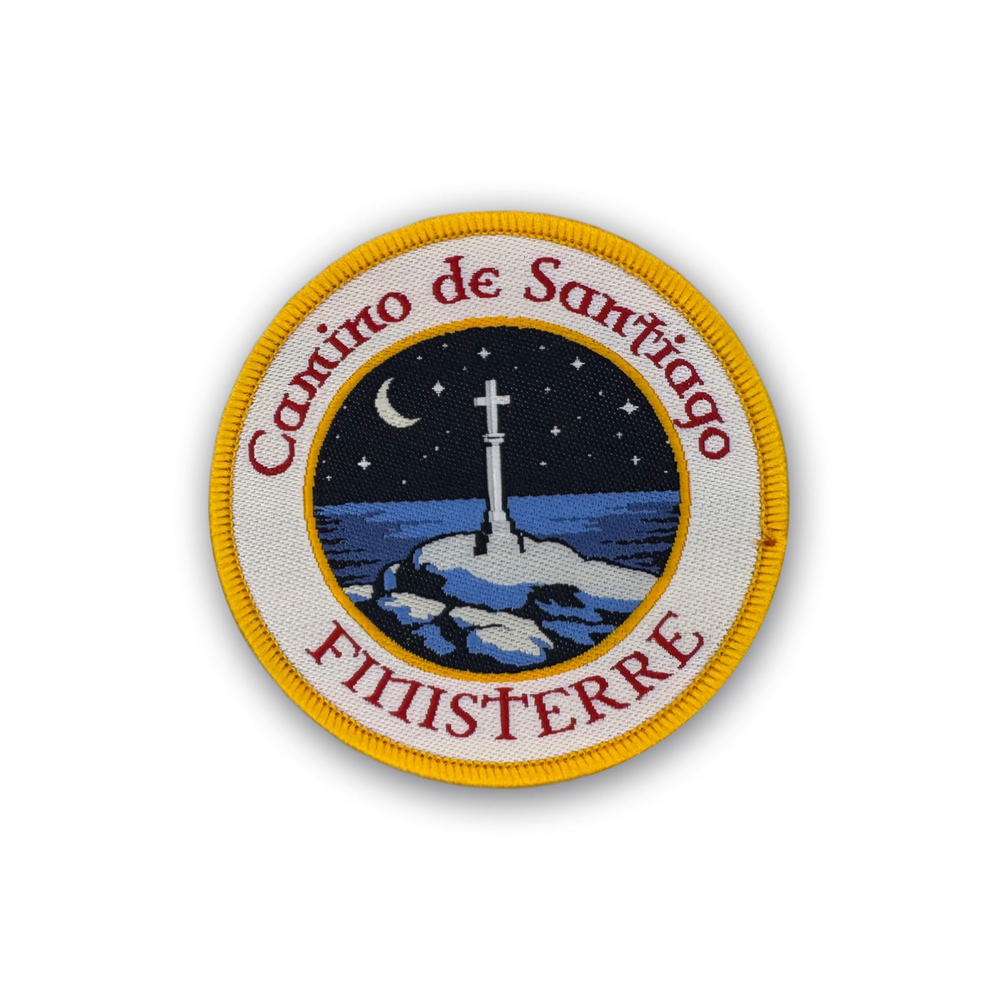 Camino Finisterre patch showing Cruz de Finisterre under a starry sky on white background