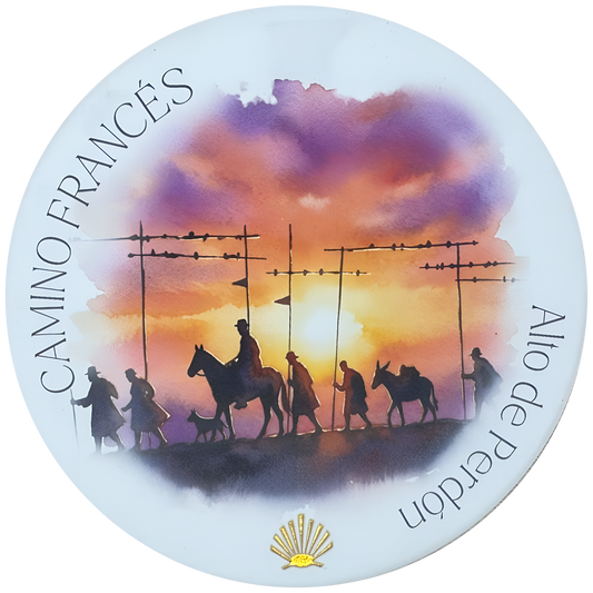 Camino Francés ceramic drink coaster featuring Alto de Perdón pilgrim silhouette watercolor with gold foil scallop shell accent 