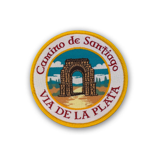 Vía de la Plata patch showing Roman Arch of Cáparra on white background