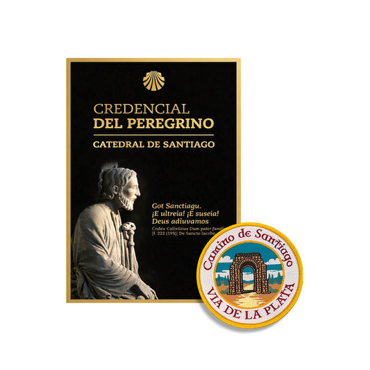 Credencial del Peregrino from the Cathedral of Santiago beside a woven Vía de la Plata patch featuring the Roman Arch of Cáparra, Camino de Santiago gift bundle