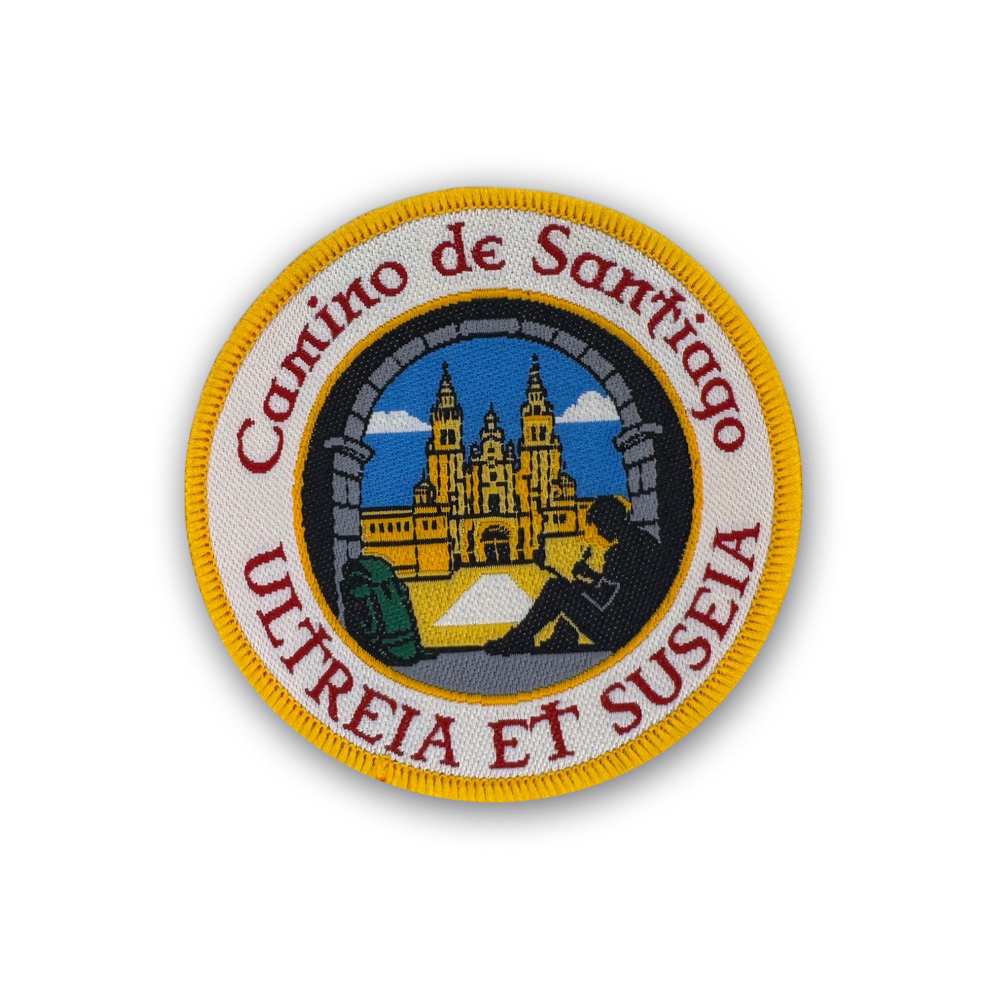 Ultreia et Suseia patch showing pilgrim writing in journal under arch at Plaza del Obradoiro on white background